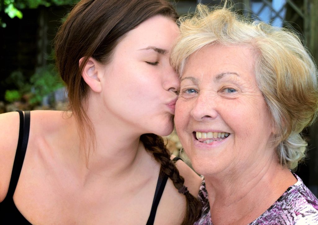 Older woman with family member